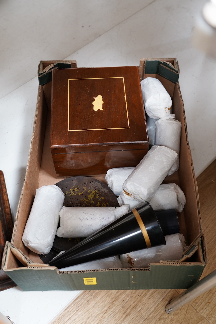 An oak cased Edison phonograph with ten rolls and a small table top polyphon with twelve 8 inch discs (2). Condition - fair to good.